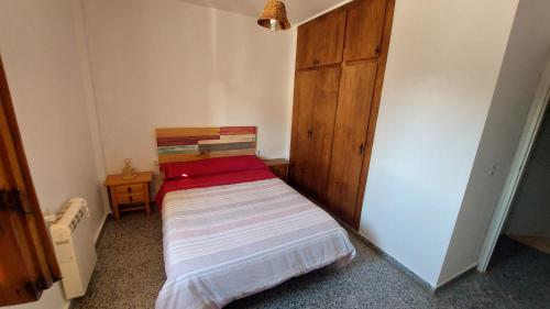 Ένα ή περισσότερα κρεβάτια σε δωμάτιο στο Alojamiento El Refugio