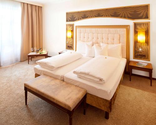 Katil atau katil-katil dalam bilik di Hotel Goldener Adler, BW Signature Collection