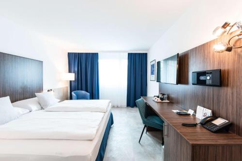 Postel nebo postele na pokoji v ubytování Best Western Smart Hotel