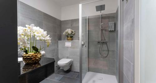 Un baño de PLAZA INN Wiener Neustadt, BW Signature Collection
