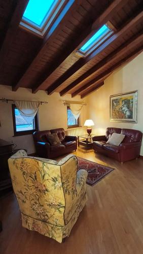 a living room with two couches and a couch at Sottocastello 2 in Gorizia