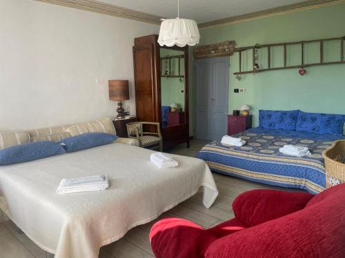 Postel nebo postele na pokoji v ubytování Cascina Teresina Monferrato Piscina