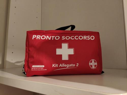 a red bag is sitting on a shelf at Sottocastello 2 in Gorizia