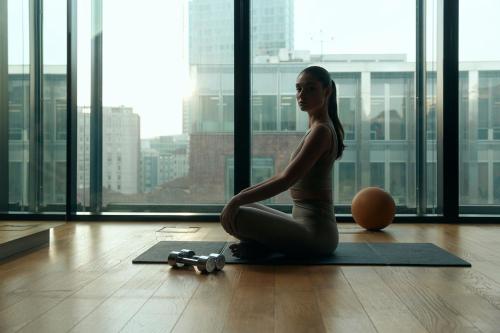 a woman sitting on the floor with a basketball and a ball at Excelsior Hotel Gallia, a Luxury Collection Hotel, Milan in Milan