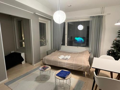 Ένα ή περισσότερα κρεβάτια σε δωμάτιο στο Polar Residence