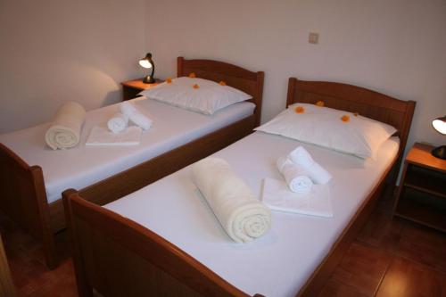 Posteľ alebo postele v izbe v ubytovaní Apartments Central