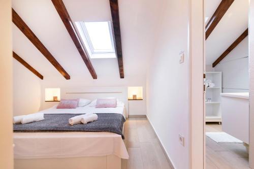 Postel nebo postele na pokoji v ubytování Apartments Filip