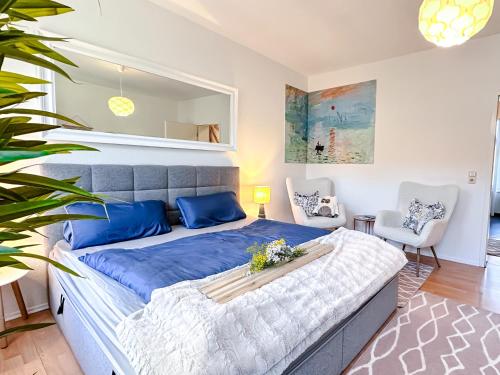 Ένα ή περισσότερα κρεβάτια σε δωμάτιο στο N&N Apartments - Stadt & Schlossblick mit eigenem Garten