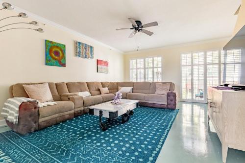 a living room with a couch and a table at Spacious 3BR 3BA with King Bed & Amazing Pools near Intercoastal, Lantana Beach, FL in Lantana
