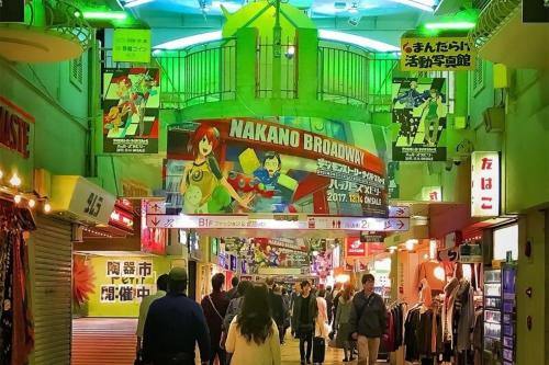 a group of people walking through a shopping mall at Cozy Nest Nakano 2 stops 5 min to Ikebukuro 7 stops to Shinjuku 15 min new 1LDK in Tokyo