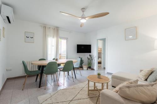 a living room with a couch and a table at Feel Welcome Barcelona 10 in Cornellà de Llobregat
