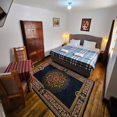 Cama o camas de una habitación en Cusco el Conquistador