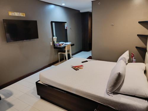 TV a/nebo společenská místnost v ubytování Hotel Sogo Quirino
