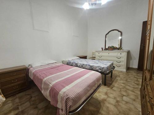 Ένα ή περισσότερα κρεβάτια σε δωμάτιο στο Mare e Pesto