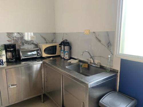 Una cocina o cocineta en Casa Mango