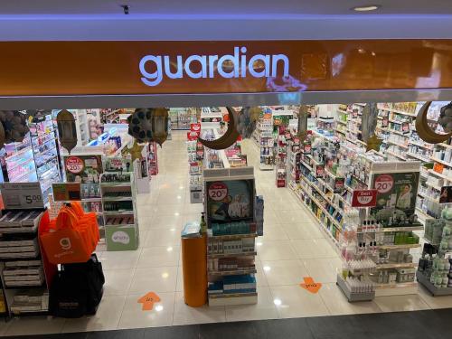 a grocery store aisle with a bunch of products at SS15 Courtyard Subang Jaya Sunway 3 Pax Studio Big 65 Inch TV Netflix WiFi #21 in Subang Jaya