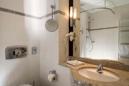 Ένα μπάνιο στο Best Western Soibelmanns Lutherstadt Wittenberg