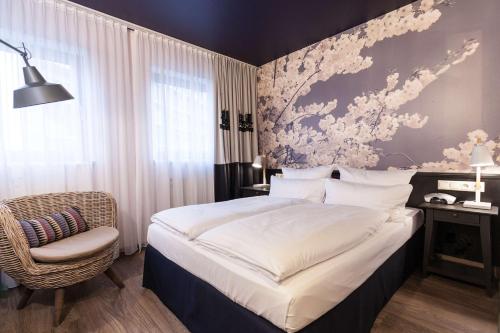 Postel nebo postele na pokoji v ubytování Best Western Hotel Nürnberg am Hauptbahnhof