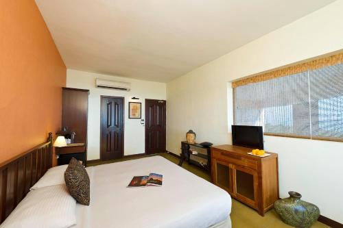 Postel nebo postele na pokoji v ubytování Annai Celestial Resorts