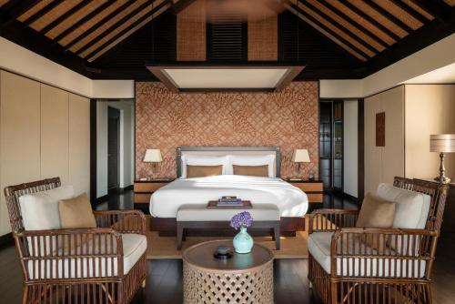 Una cama o camas en una habitación de Raffles Bali