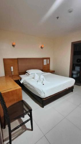 Katil atau katil-katil dalam bilik di Asia Novo Boutique Hotel - Dumaguete