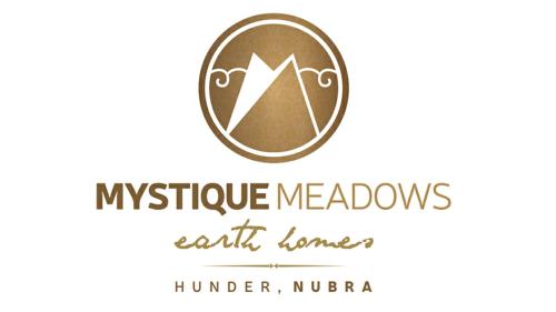 a logo for myristic meadows earth lands at Mystique meadows earth homes in Hundar
