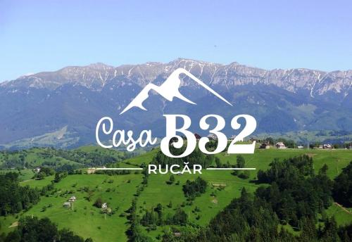 a sign that says cisco on a green field at Casa B32 Spa Rucar in Rucăr