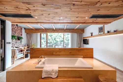 Fotografie z fotogalerie ubytování Kaichen Puju Hot Spring Village Resort Hotel v destinaci Deqing
