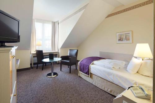 Postel nebo postele na pokoji v ubytování Best Western Hotel Helmstedt am Lappwald