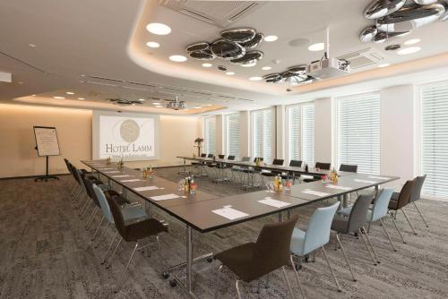 a large conference room with a long table and chairs at Best Western Hotel Lamm in Singen