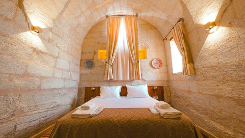 Katil atau katil-katil dalam bilik di Logos Cave Cappadocia - Adults Only