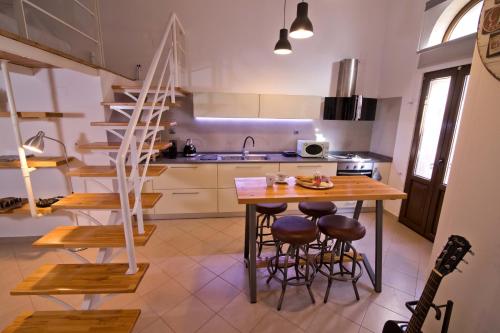 Kuchyň nebo kuchyňský kout v ubytování FOTEINI RESIDENCE
