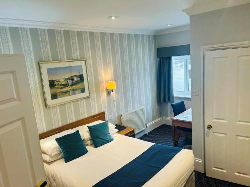 Ένα ή περισσότερα κρεβάτια σε δωμάτιο στο The Birch Hotel