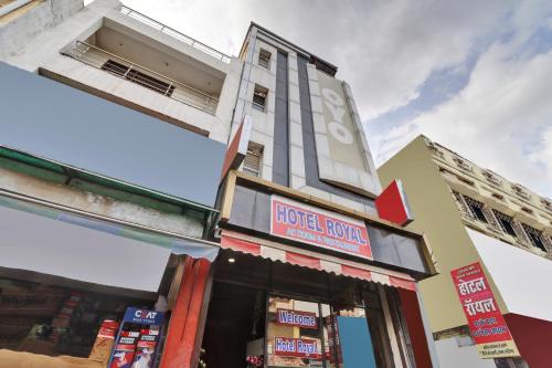 a building with a sign for a hotel room at OYO 82518 hotel Royal in in Gwalior