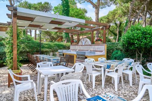 Jardin de l'établissement Jesolo Pines Beach House - Host Solution