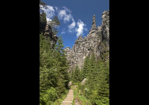 a path in front of a rocky mountain at Pension Dita - Adršpach in Teplice nad Metují