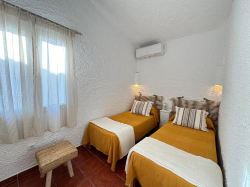 Ένα ή περισσότερα κρεβάτια σε δωμάτιο στο Villa Noni monsines