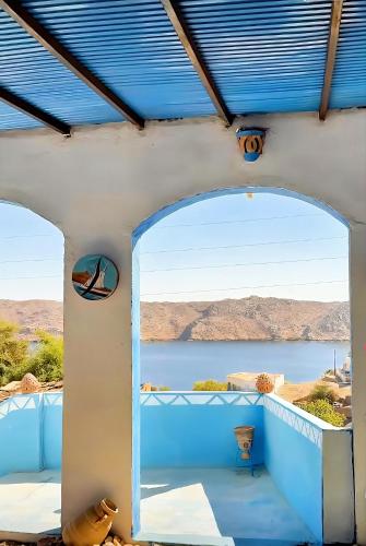 a view of the water from the balcony of a house at Asilah kato nubian guest house in Aswan