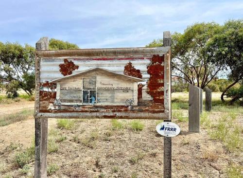 a sign with a picture of a house at Woomelang Cabin Silo Trail Two Bedroom Cabin Queen and KSing in Woomelang