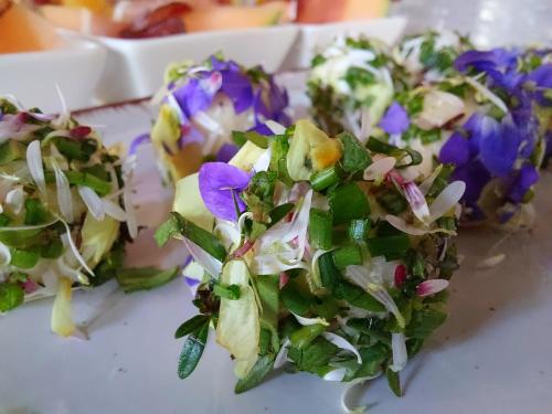 a close up of a salad on a plate at Gästehaus Daurer in Reinsberg