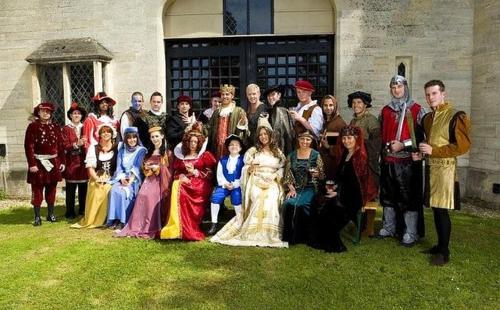 a group of people posing for a picture in front of a building at Entire Castle & Grounds for 18, Banquet Hall & BBQ in Trowbridge