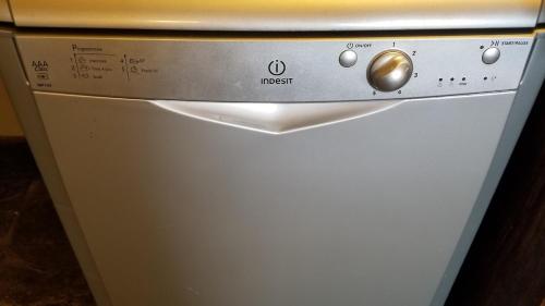 a close up of a dishwasher in a kitchen at Entire Castle & Grounds for 18, Banquet Hall & BBQ in Trowbridge