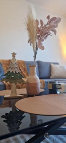 Ein Sitzbereich in der Unterkunft Le Médoc'Home