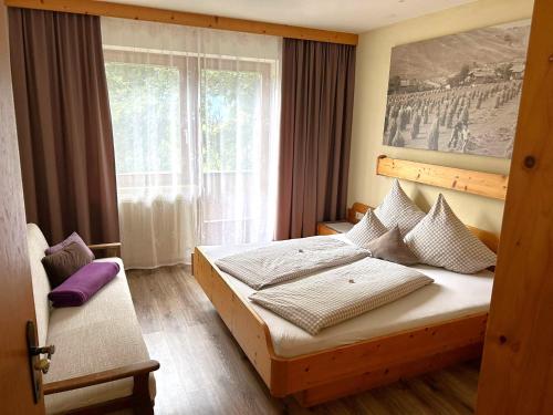 Postel nebo postele na pokoji v ubytování Stangleggerhof