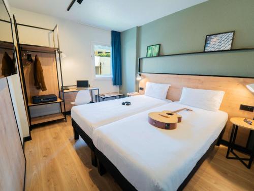 Postel nebo postele na pokoji v ubytování Hotel ibis Guimaraes