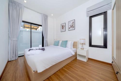 Katil atau katil-katil dalam bilik di Goldena Twin Private Pool Villas