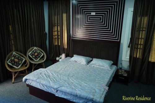 Cama o camas de una habitación en Riverine Residence