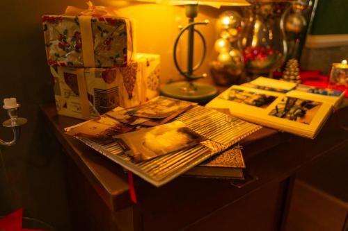 a table with presents and books on top of it at Parkhotel Waldschlösschen in Annaberg-Buchholz
