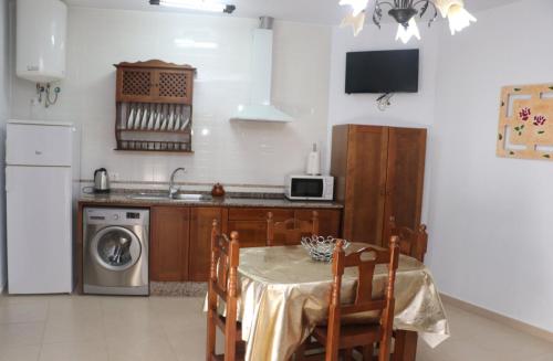 Kuchyň nebo kuchyňský kout v ubytování Apartamento Pascual Junquera II