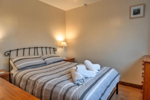 Ένα ή περισσότερα κρεβάτια σε δωμάτιο στο Finest Retreats - No1 Gladys Orchard